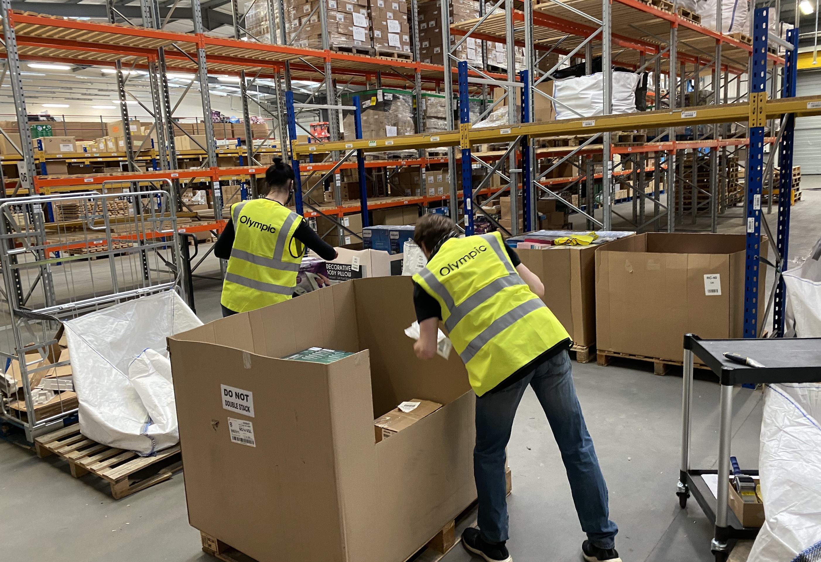 Olympic team processing returns in warehouse